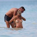 *Warning contains nudity* Laura Cremaschi topless at the beach in Miami