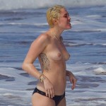 MIley Cyrus - topless Hawaii 15